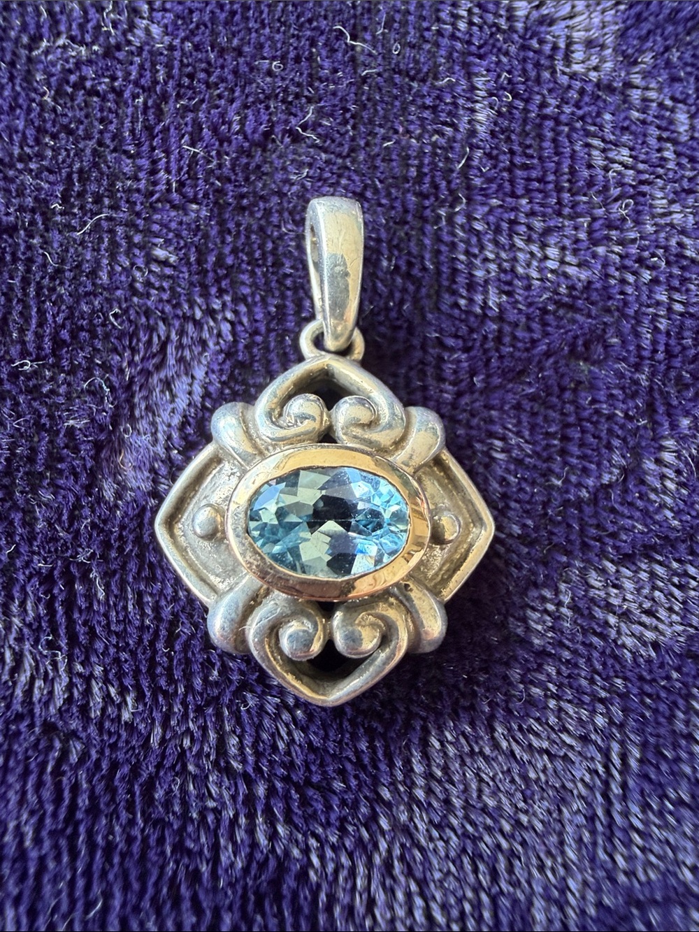Vintage 14K gold and 925 sterling silver pendant with blue gemstone